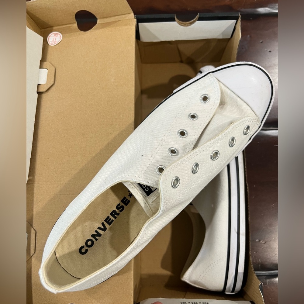 brand new fresh white converse sneakers, comfy and easy without laces.